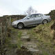 Illustration for article titled British BMW Driver Follows Sat Nav To Cliff Edge, Darwin Loses